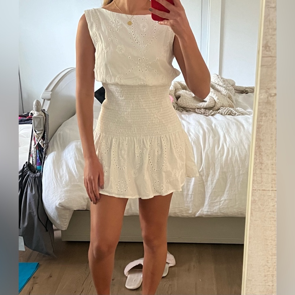 Isabelle’s cabinet white backless dress
